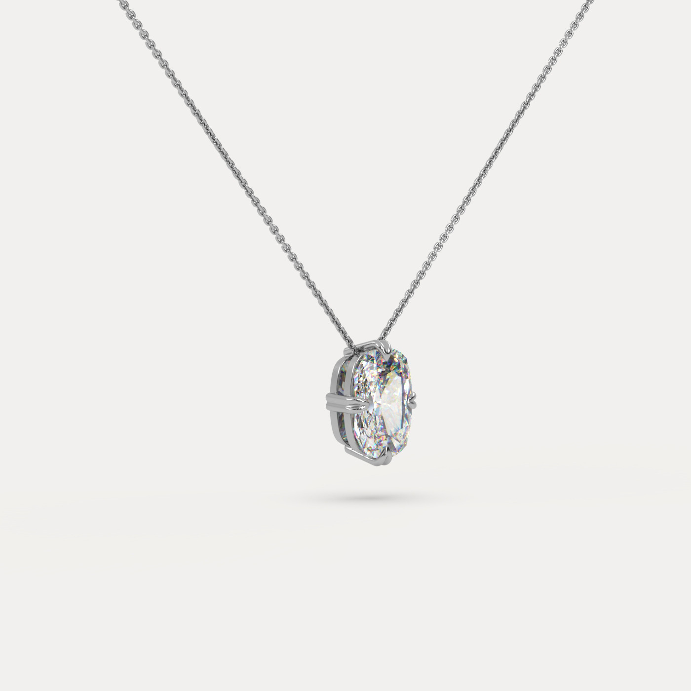 angled view of Solitaire Elongated Cushion Cut Diamond Pendant in 18K White Gold