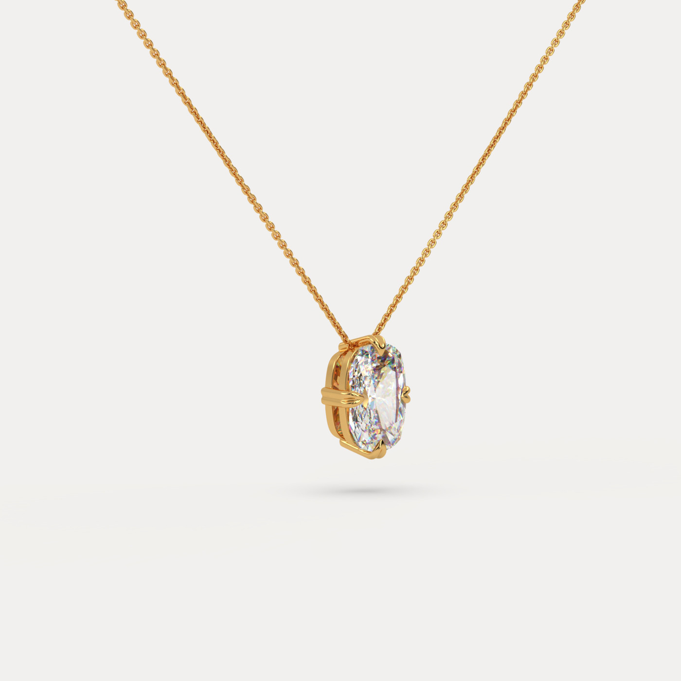 angled view of Solitaire Elongated Cushion Cut Diamond Pendant in 18K Yellow Gold