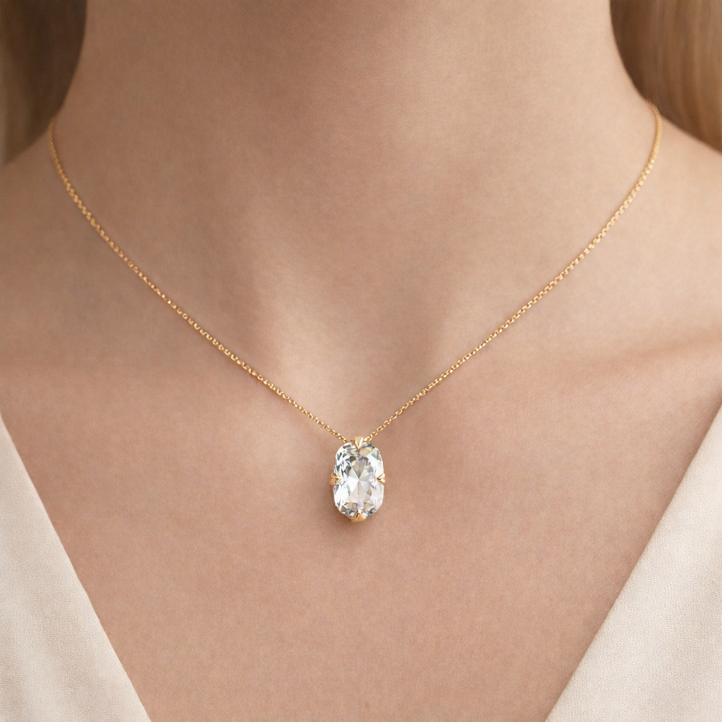 Solitaire Elongated Cushion Cut Diamond Pendant worn on neck in 18K Yellow Gold