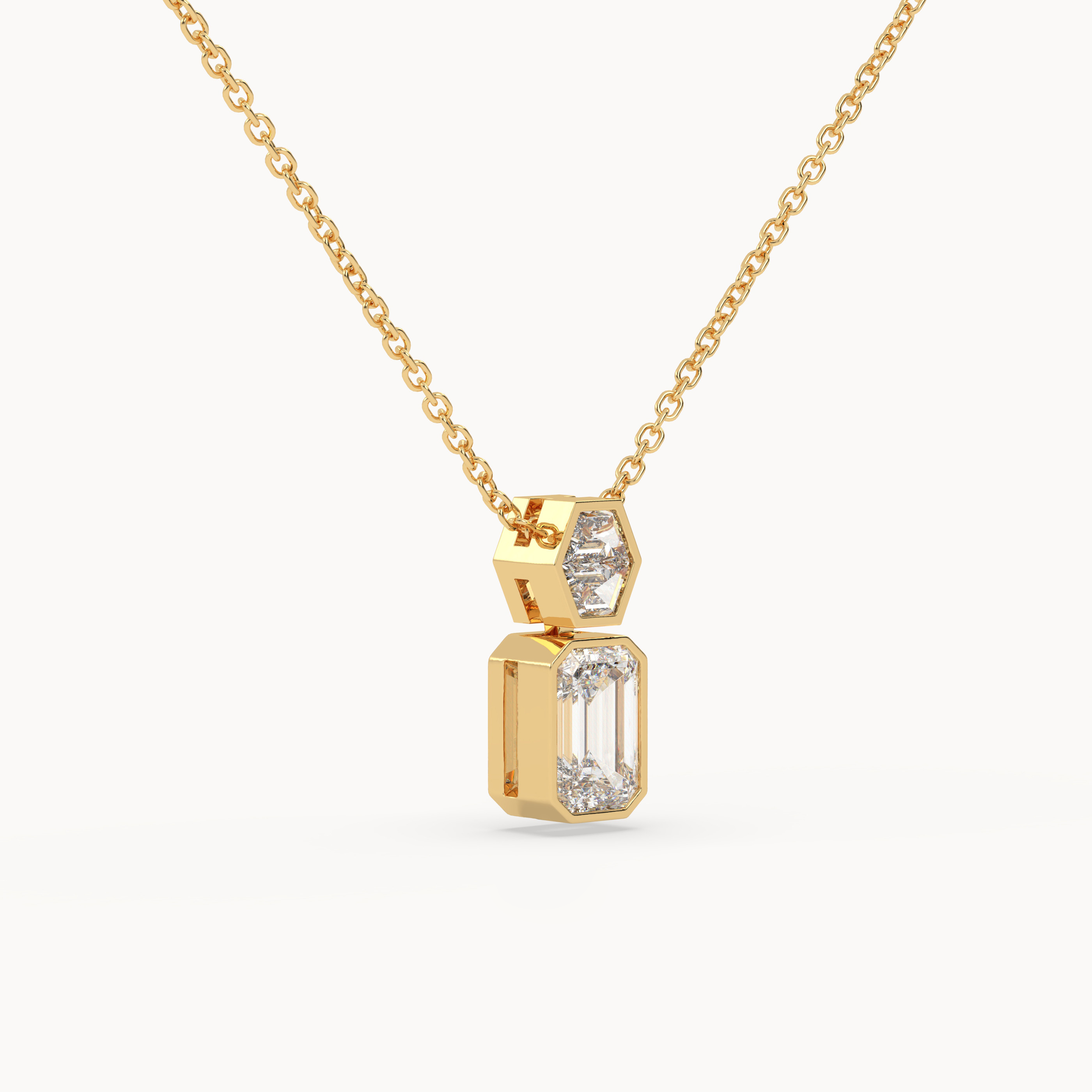 angled view of Emerald Drop Diamond Pendant – 2.2 ct in 18K Yellow Gold