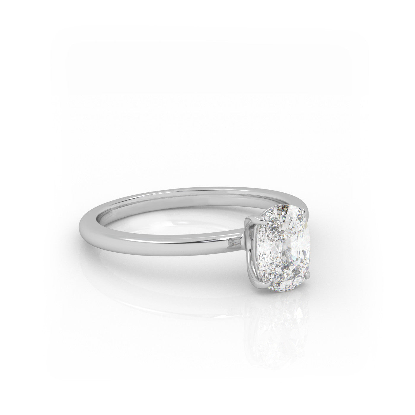 angled view of Solitaire Elongated Cushion Diamond Ring in 18K White Gold