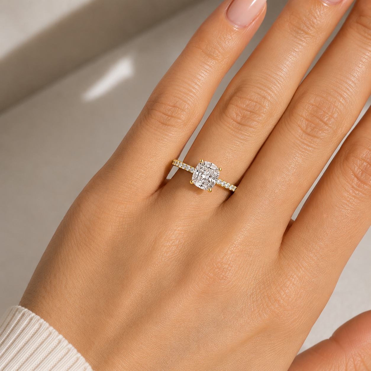 Cushion Pavé Solitaire Diamond Engagement Ring worn on hand in 18K Yellow Gold