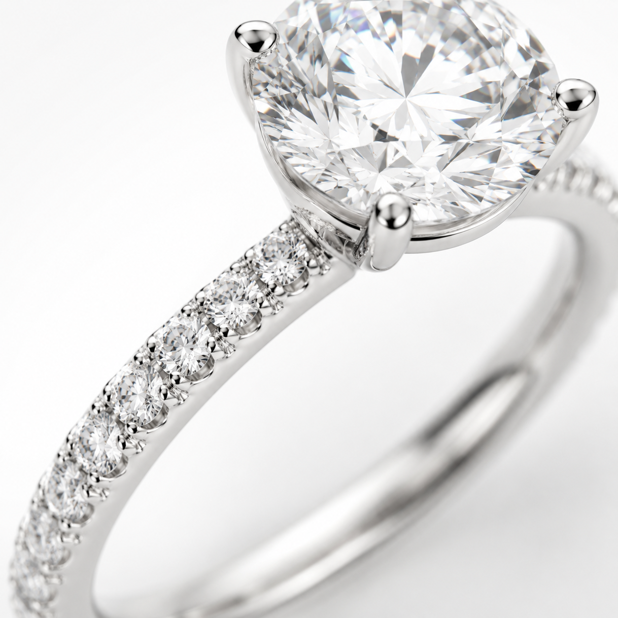 image of Round Pavé Solitaire Diamond Engagement Ring in 18K White Gold
