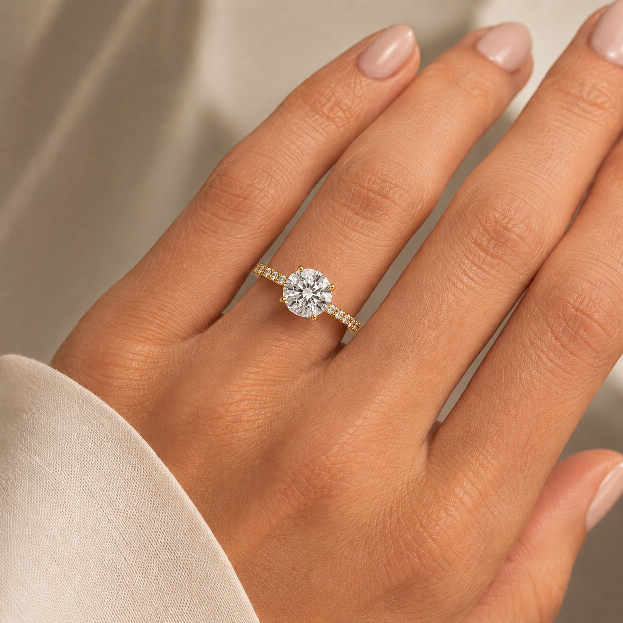 Round Pavé Solitaire Diamond Engagement Ring worn on hand in 18K Yellow Gold