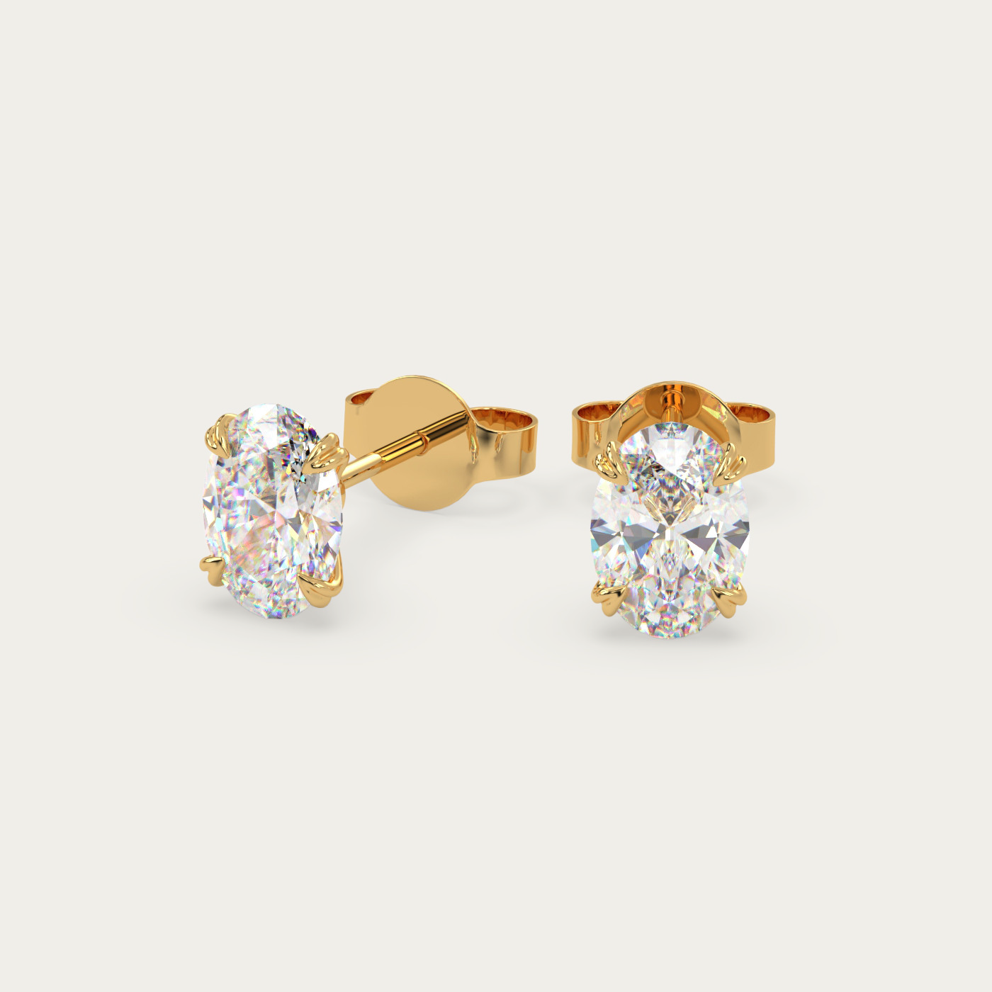 front view of Oval Cut Diamond Stud Earrings in 18K Yellow Gold