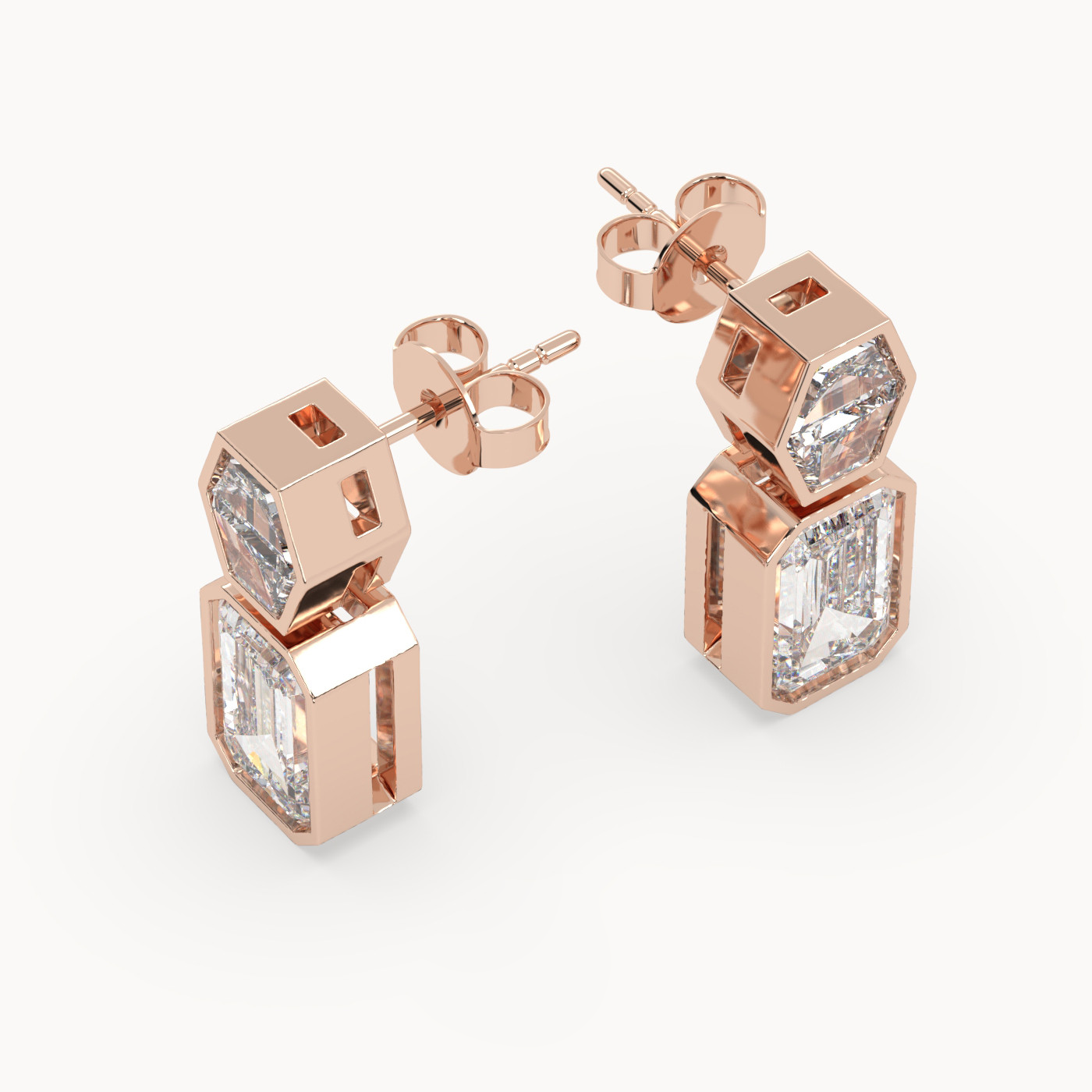 angled view of Emerald Drop Diamond Earrings in 18K Rose Gold
