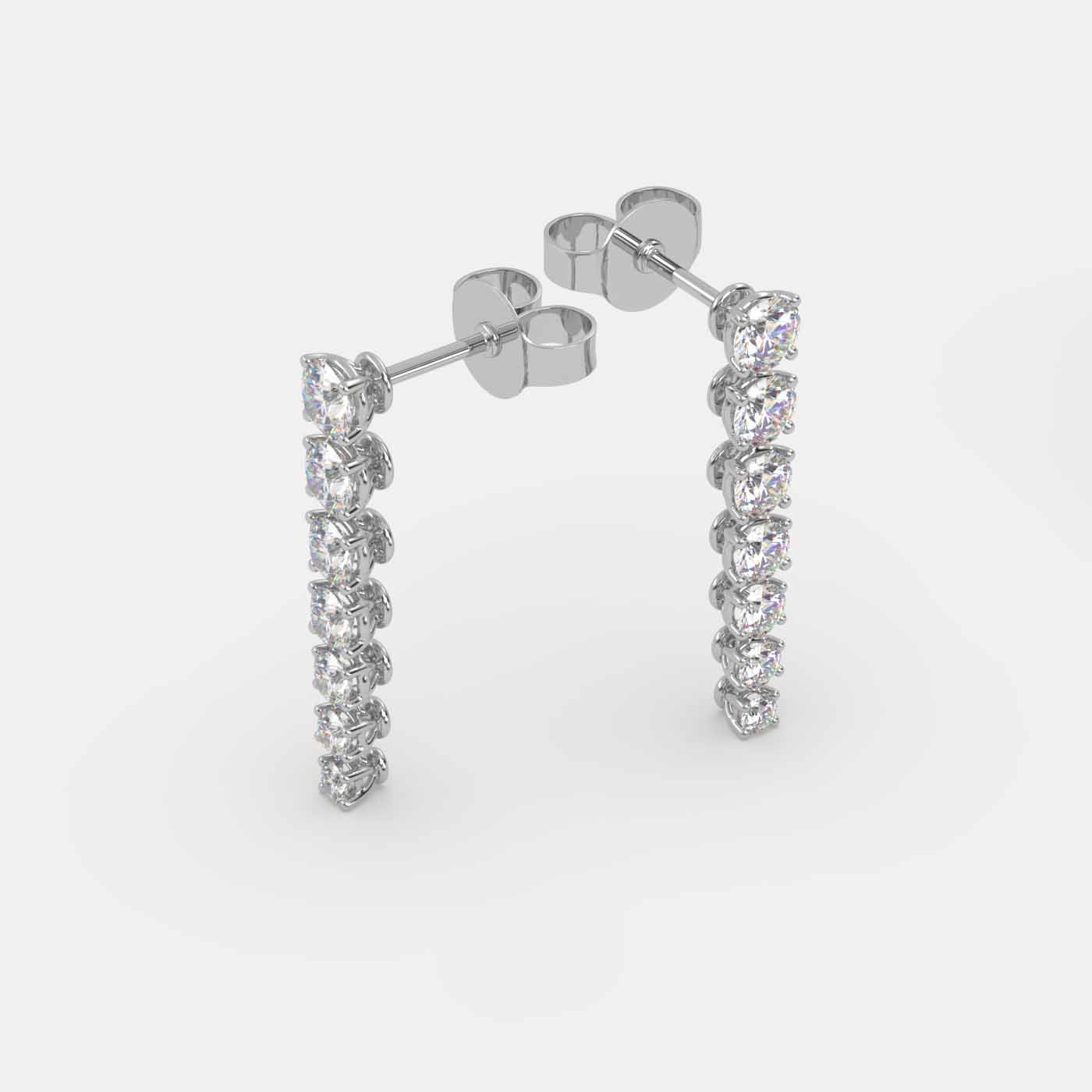angled view of Diamond Vine Drop Earrings in 18K Yellow Gold