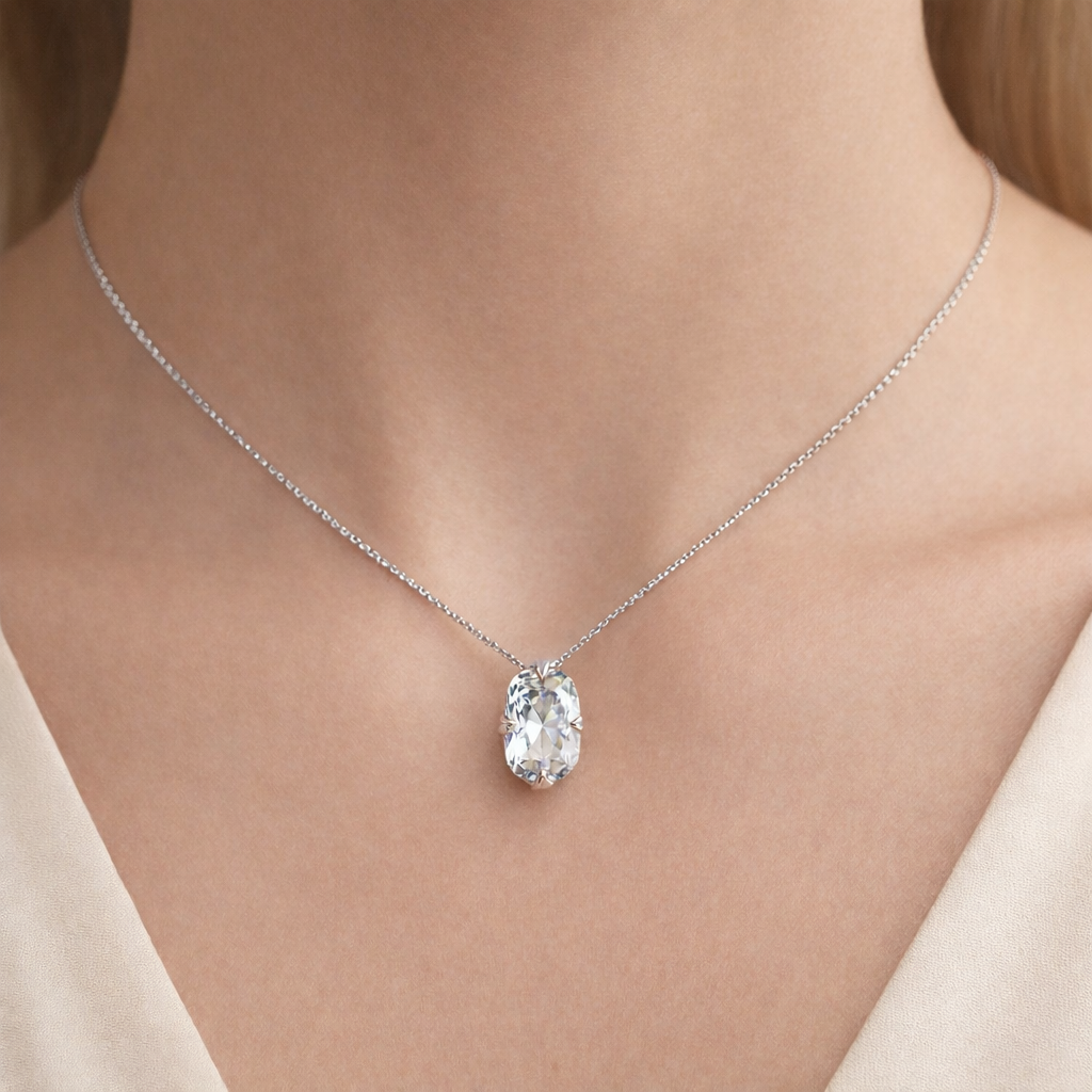 Solitaire Elongated Cushion Cut Diamond Pendant worn on neck in 18K Yellow Gold