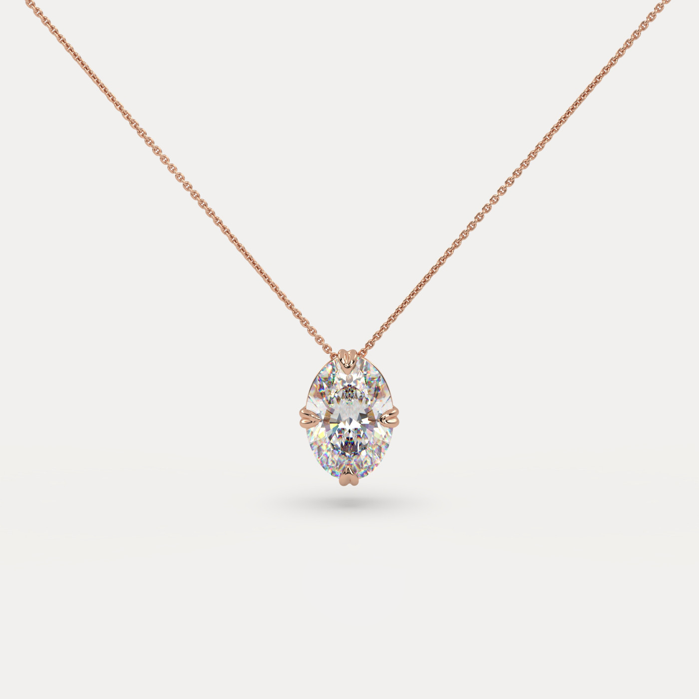 front view of Solitaire Oval Cut Diamond Pendant in 18K Rose Gold