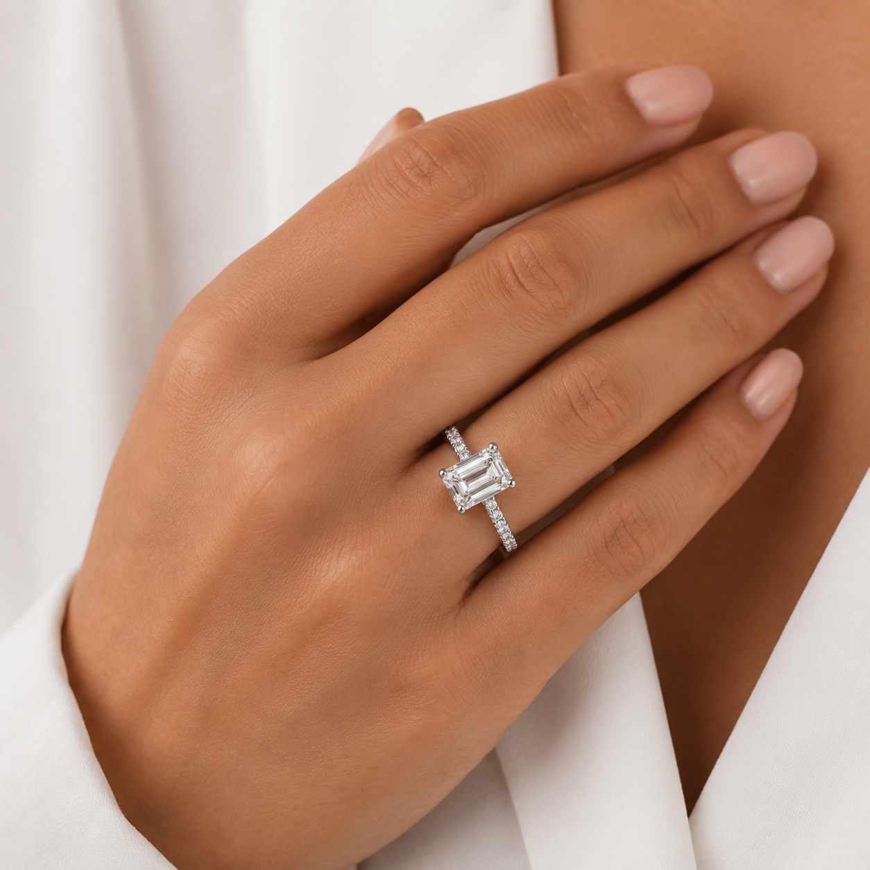 Emerald Pavé Solitaire Diamond Engagement Ring worn on hand in 18K White Gold