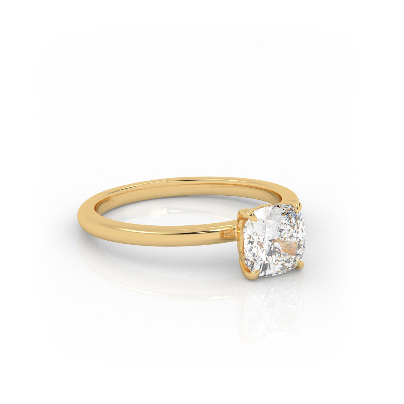 angled view of Solitaire Cushion Diamond Ring in 18K Yellow Gold