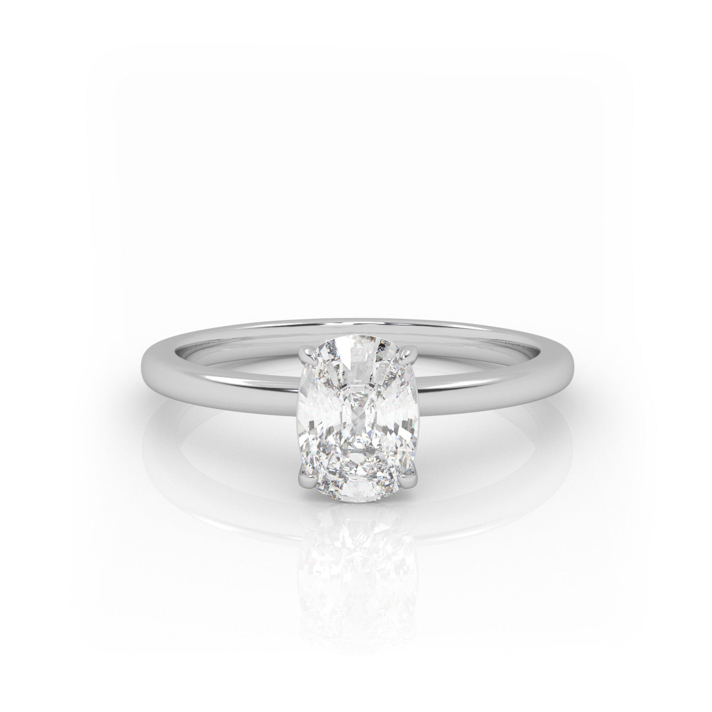 straight front view of Solitaire Elongated Cushion Diamond Ring in 18K White Gold