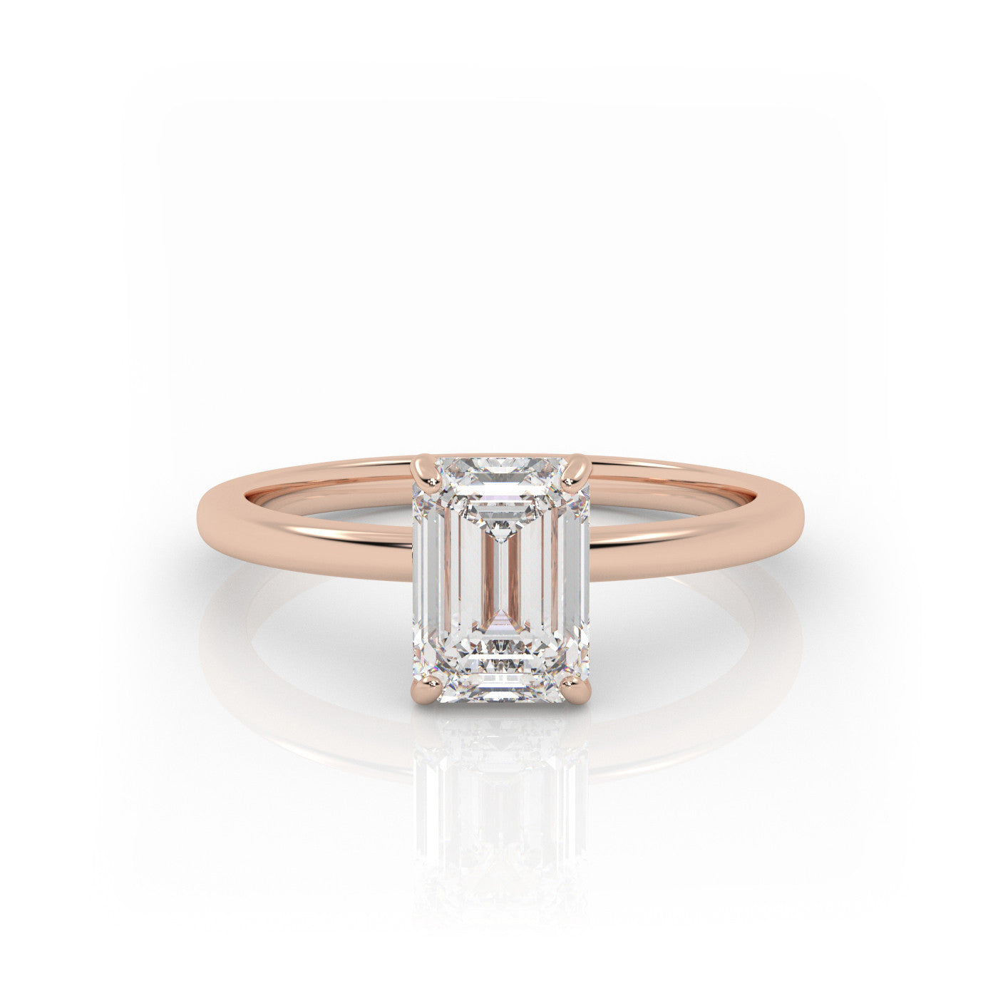 straight front view of Solitaire Emerald Cut Diamond Ring in 18K Rose Gold