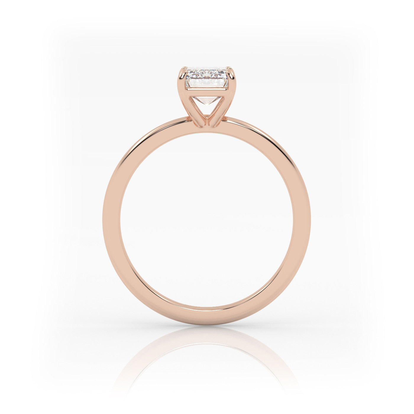 side profile of Solitaire Emerald Cut Diamond Ring in 18K Rose Gold