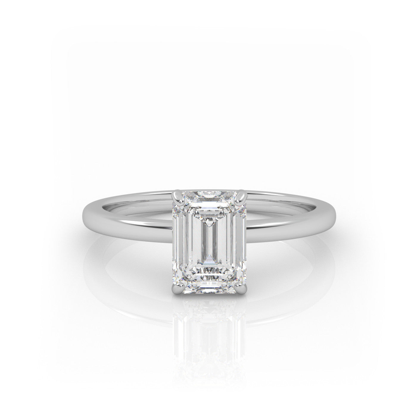 straight front view of Solitaire Emerald Cut Diamond Ring in 18K White Gold