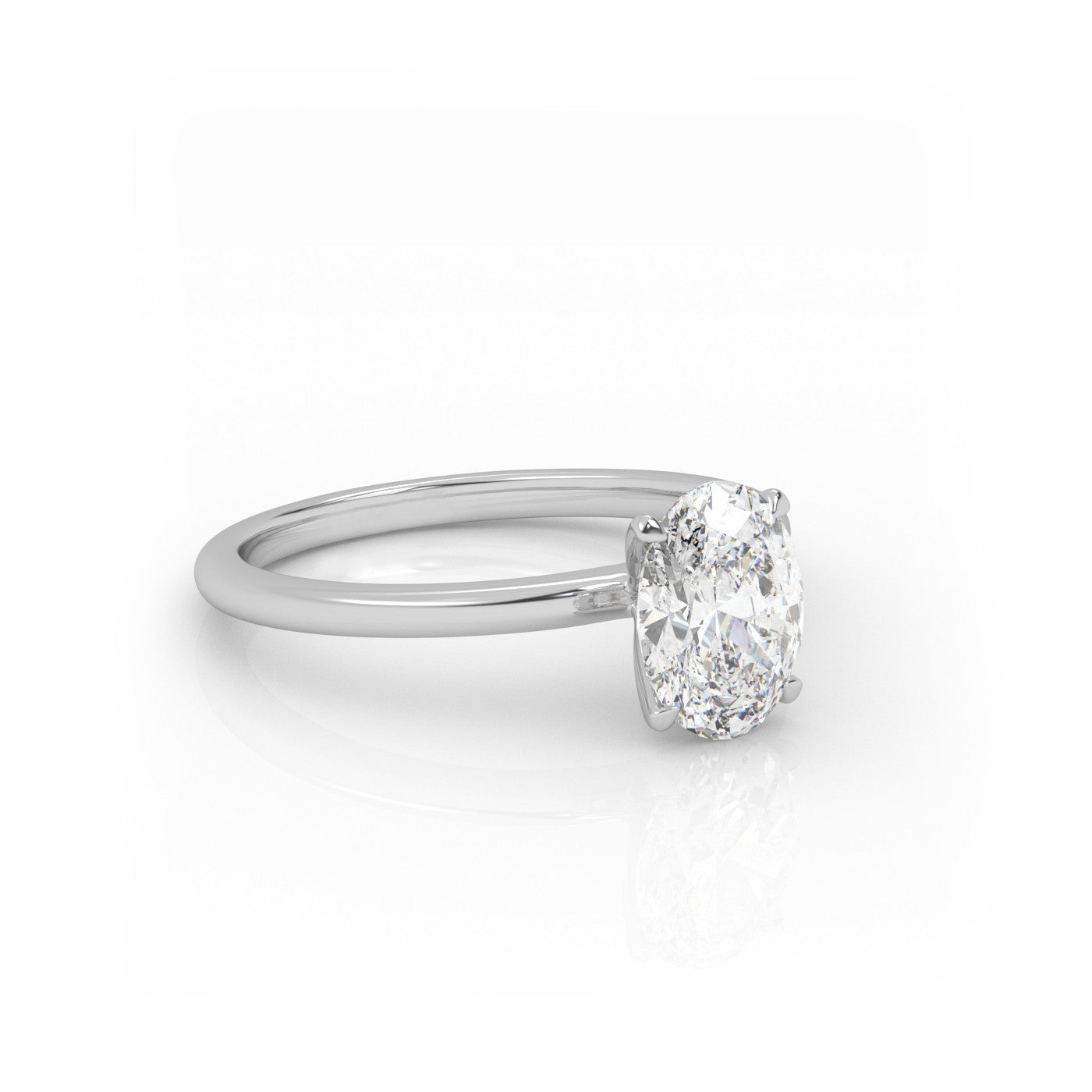 angled view of Solitaire Oval Diamond Ring in 18K White Gold