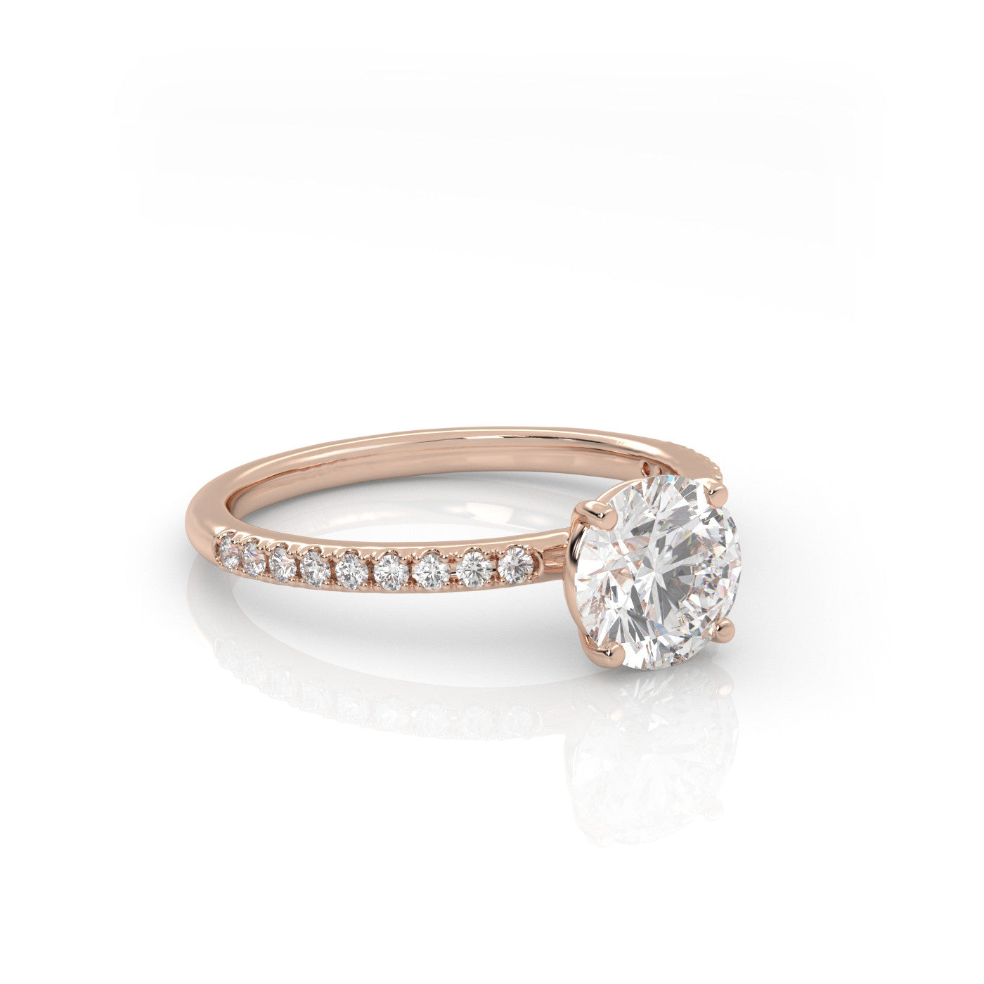 angled view of Round Pavé Solitaire Diamond Engagement Ring in 18K Rose Gold