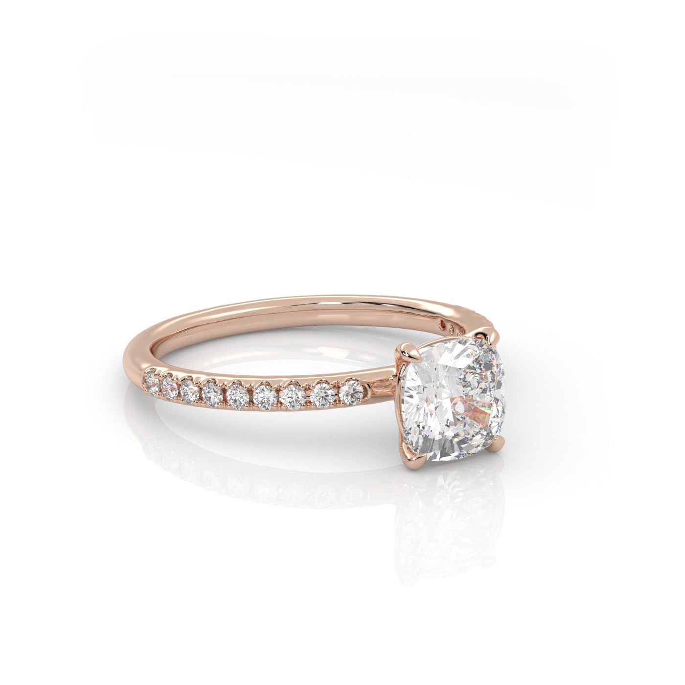 angled view of Cushion Pavé Solitaire Diamond Engagement Ring in 18K Rose Gold