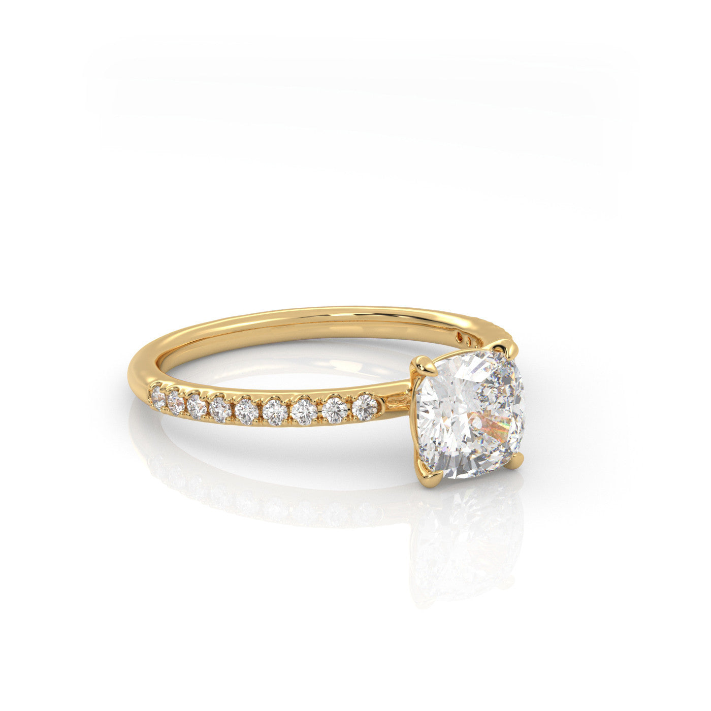 angled view of Cushion Pavé Solitaire Diamond Engagement Ring in 18K Yellow Gold