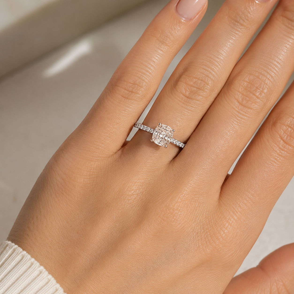 Cushion Pavé Solitaire Diamond Engagement Ring worn on hand in 18K White Gold
