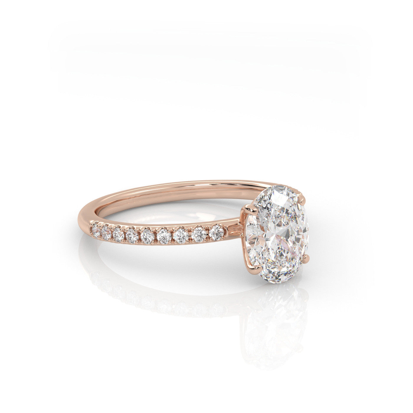 angled view of Oval Pavé Solitaire Diamond Engagement Ring in 18K Rose Gold
