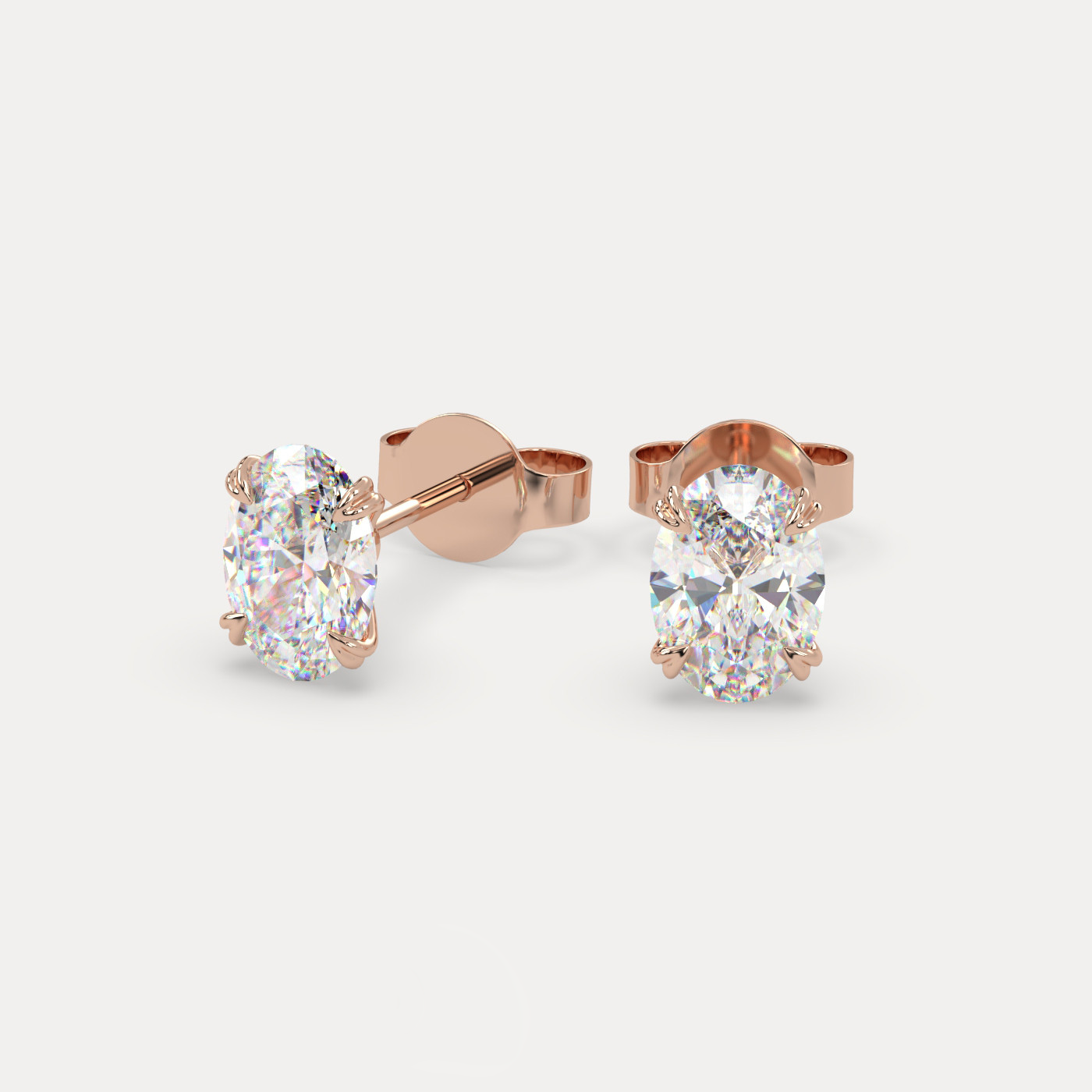 front view of Oval Cut Diamond Stud Earrings in 18K Rose Gold