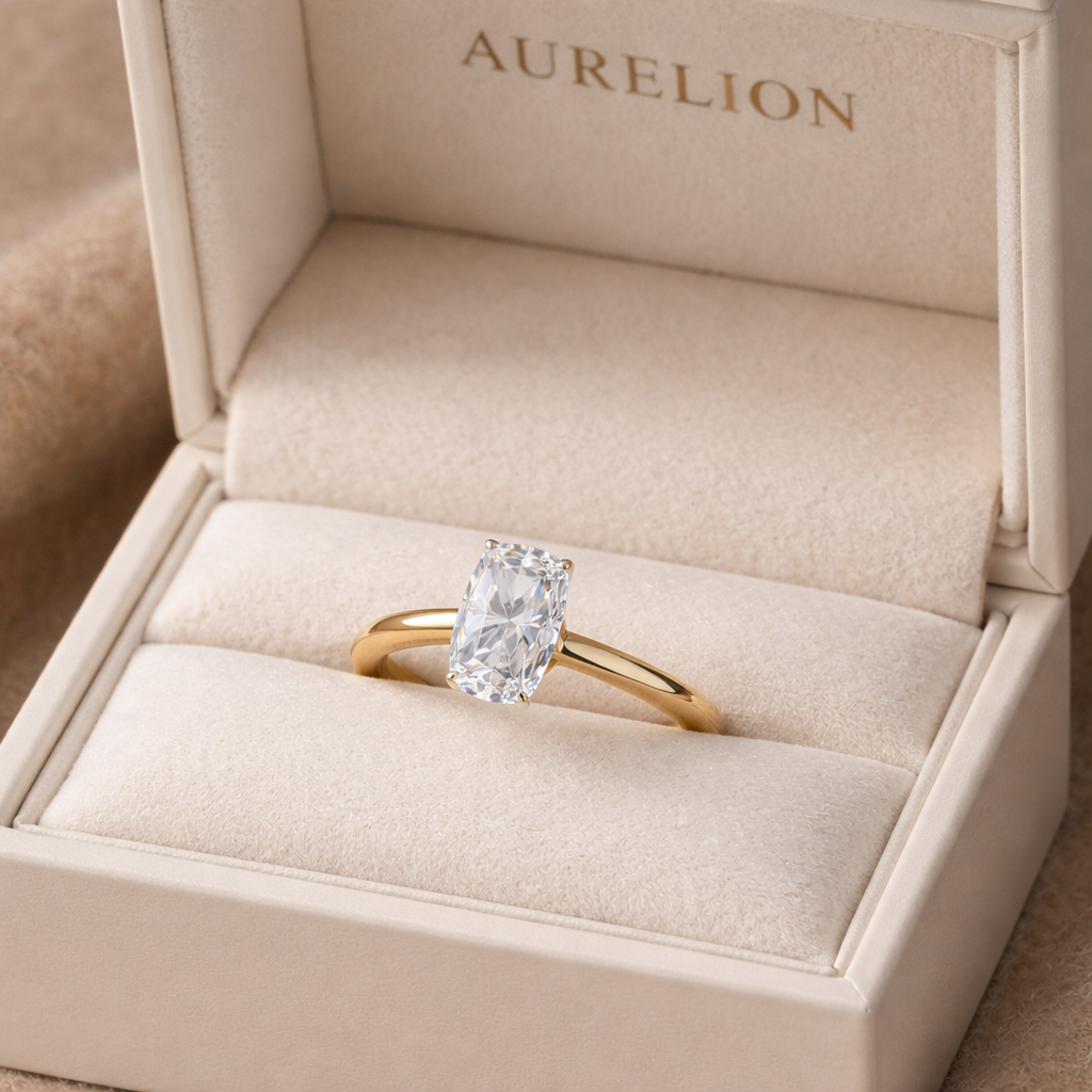 Solitaire Elongated Cushion Diamond Ring presented in Aurelion Diamonds ring box in 18K Yellow Gold